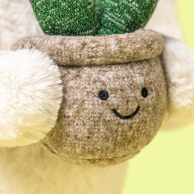 JELLYCAT CREAM BUNNY WITH PLANT