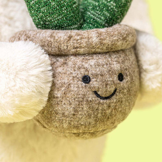 JELLYCAT CREAM BUNNY WITH PLANT