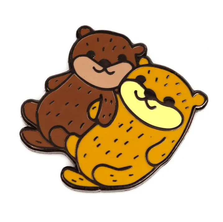HOLDING HANDS OTTERS PIN