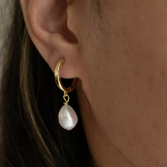 GOLD DANGLING BAROQUE PEARL HUGGIE HOOPS